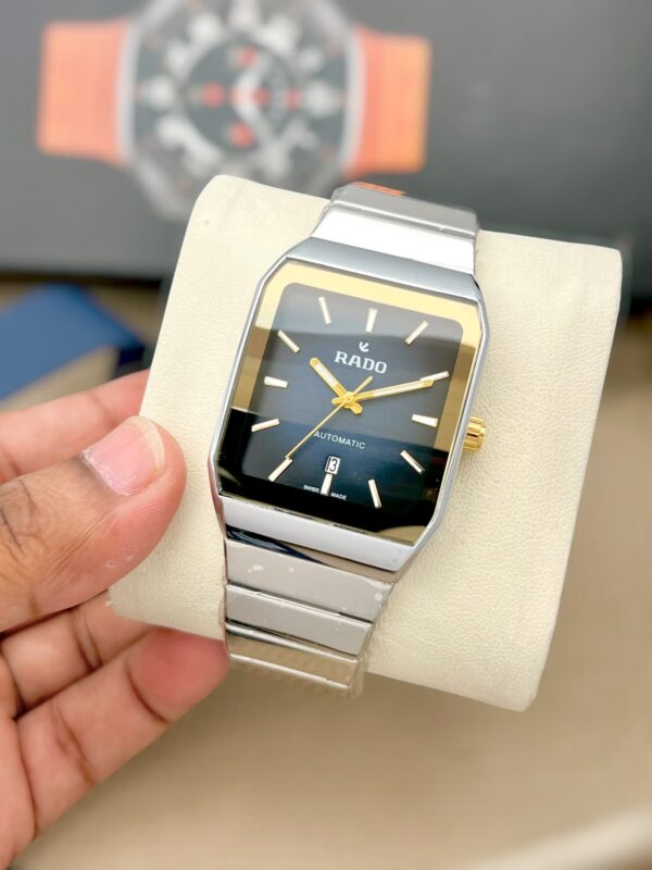 A sleek, modern luxury timepiece featuring Rado's signature square design. (064)